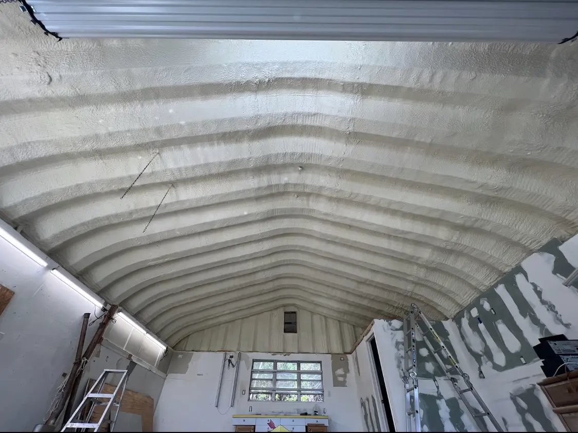 Spray polyurethane foam applied to the underside of a metal roof deck in Contra Costa Centre